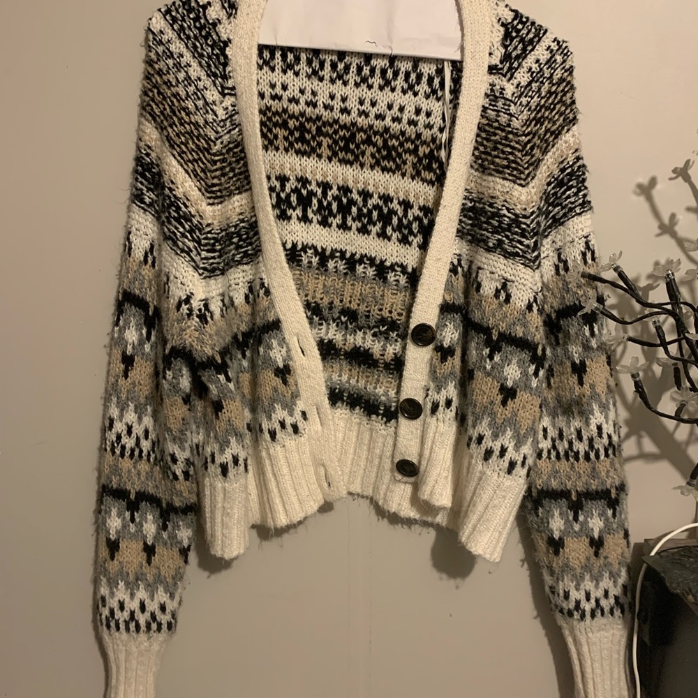 Oversized knitted wool cardigan.